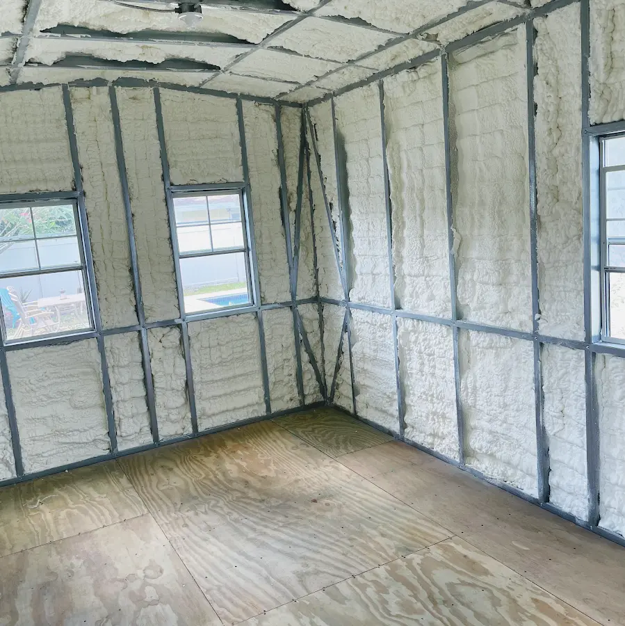 Closed-cell spray foam insulation applied to wall cavities in a residential project in Inglewood